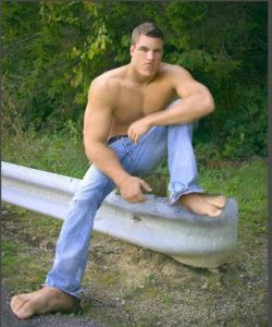 “Aw man, it shore is swell of y'all to gimme a ride. Ah had to ditch my shoes a wayse back cuz they was so tore up&quot;  As the massive shirtless hitchhiker Mitch crammed his bulk into your car you could only stare at his enormous feet. It was hard