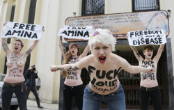 hipsterishblog:  sootonthecarpet:  turv:   Members of Ukrainian feminist group Femen staged protests across Europe as they called for a “topless jihad.” The demonstrations were in support of a young Tunisian activist named Amina Tyler. Last month,