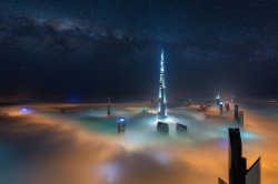 adurot:  nubbsgalore:  photos from dubai’s 828 meter tall burj khalifa (save the first and last photos, which show the building) by (click pic) daniel cheong, karim nafatni, bjoern lauen and dave alexander. duabai only experiences this in september