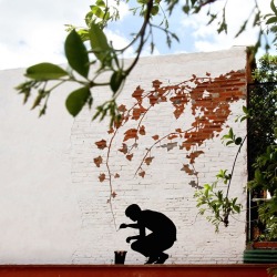 Finishing touches (street art by Pejac)