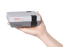 nintendocafe:  Nope, this is not a retro image. The NES is coming back to stores! Pick  up the Nintendo Entertainment System: NES Classic Edition on 11/11, a  new mini NES that lets you plug in and play 30 included games like Super  Mario Bros. 3, Mega