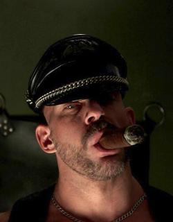 samuelmuscle: Great pic of me in leather smoking a cigar for SmokingHunks.com. You can find all the video from this sexy leather photoshoot on their website now. Check them out!