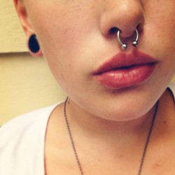 ccc0urtney:  Got a new septum ring, but had to  stretch it to get the piercing through and looks huge on my face. *sigh* Oh well. #me #piercing #septum #stretchedears #bodymodification #modprobs #thestruggle
