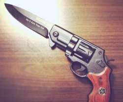 awesomeshityoucanbuy:  Revolver Gun KnifeFool everyone into thinking you’re packing heat with the revolver gun knife. Cleverly disguised as a classic revolver – complete with hardwood handle and sheriff’s badge – it folds out into a unique knife