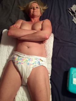 thebambinogirl:  Getting my diaper changed while I am responding to messages from my followers. Daddy put me in my very baby diapers!  I use to be embarrassed when Daddy told me to post photos like these that allow you to see my private parts. But now