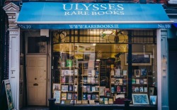 cair–paravel:Ulysses Rare Books, Dublin. It is focussed primarily on Irish authors, and the shop awning is the exact same shade of blue that James Joyce demanded for the cover of Ulysses (matching the blue of the Greek flag).