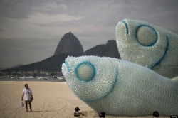 inthemess:  An artist (name?) at UNCED created giant fish sculptures out of plastic bottles to highlight the plastic debris problem. via Huffpo 