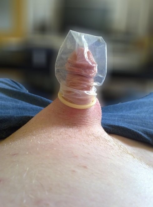 Huge cock with condom on