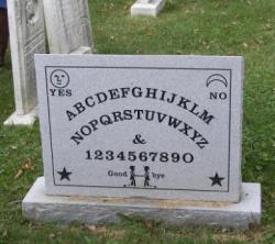 This is the headstone of Elijah Bond the man who patented the ouija board. http://en.wikipedia.org/wiki/Ouija