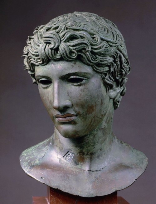 classicalmonuments:    Bust of a Youth (“The Beneventum Head”)  Herculaneum, Italy50 BCE33 cm  in heightBronzeCopper inlays for the lips    The sculpture portrays the face of a young man barely out of adolescence. His lips were embellished with red