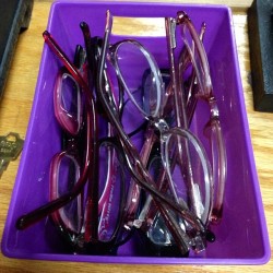 A container of lost glasses in the office at #thejrz school. #lost #glasses