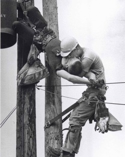 peashooter85:  The Kiss of Life Taken in 1967 by Rocco Morabito, this photo called “The Kiss of Life” shows a utility worker named J.D. Thompson giving mouth-to-mouth to co-worker Randall G. Champion after he went unconscious following contact with