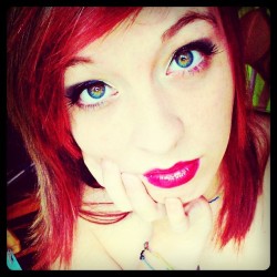 xkeekat:  #me #redhair #hazeleyes I miss my bright red hair. ._.
