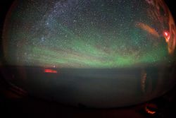 sixpenceee:  Mysterious Red Glow Over Pacific A pilot and his co-pilot have spotted a mysterious orange and red glow over the Pacific Ocean. The strange lights were spotted south of the Russian peninsula Kamchatka during the flight of a Boeing 747-8