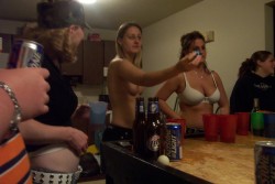 stripgamefan:  An amazing mostly topless strip beer pong game - the last few photos show the girl in the cap getting completely naked.