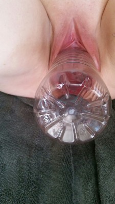 holegirl:  Stretching with all my heart ❤  Today I started with the 0.5 ltr in my pussy for 20 min before switching to the 1 ltr bottle as instructed by him after yesterday.  I had the 1 ltr (pic 1 ) in for 15 min and had to cum 2 times with it in my