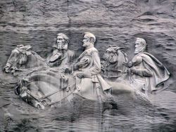 thecivilwarparlor:  Stone Mountain Near Atlanta, Depicting Confederate Heroes: Jefferson Davis, Robert E. Lee, and Stonewall Jackson. Its Is The Largest Base Relief Sculpture In The World At its summit, the elevation is 1,686 feet MSL and 825 feet above