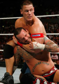 Cena with a tight headlock on Punk!