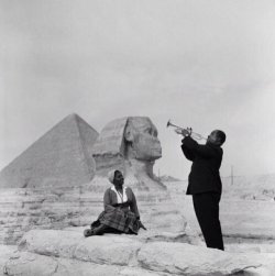 history-inpictures:   Louis Armstrong plays for his wife in Giza, 1961  