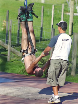 nakedguys99:  I would love to be a crew member of the bungee jump recovery team! He doesn’t seem in any hurry to untie the jumper from the harness! Meanwhile his crew captain keeps snapping pics of all the tourists doing naked jumps!Check out these
