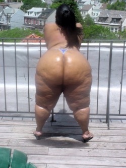 fatcurvystories:  giant deposit of cellulite on display obese thighs on the street for everyone to see iluvbbwass:  Godzilla ass 