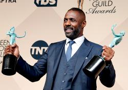 tepitome:  mcavoys:     Idris Elba, winner of the Outstanding Performance by a Male Actor in a Supporting Role award for ‘Beasts of No Nation’ and Outstanding Performance by a Male Actor in a Television Movie or Miniseries award for ‘Luther,’