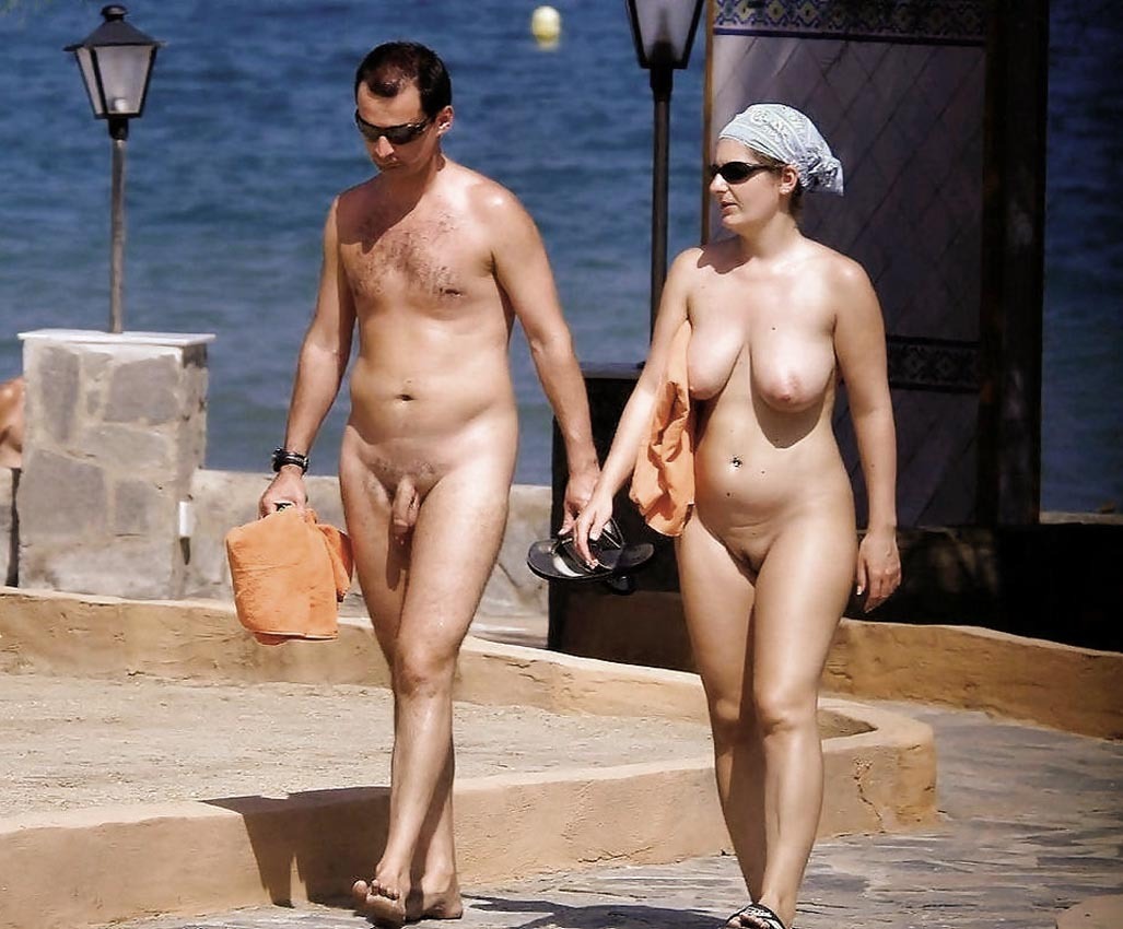 Public nude couple on beach