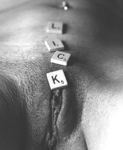 slut-problems:  People say sluts are stupid, but I present to you Exhibit X: This slut is obviously highly intelligent and has found a way to get what she wants by spelling words on her body with scrabble tiles! I rest my case.