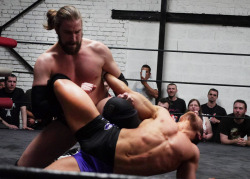 sufferingmen:  jakeslammer:  My Favorite Wrestler Chris Hero (Totally Underated BTW) Stretching Out Tristan Archer In a Catch Match, France.  Love seeing the French stud get his luscious body get Completely Twisted Out. He’s perfectly positioned to