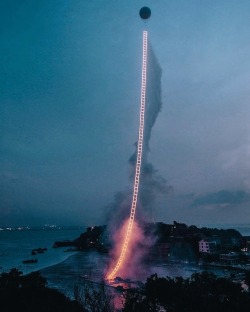 design-art-architecture:  “… the ladder rose toward the morning sun, carrying hope. For me, this not only means a return but also the start of a new journey.” New York based artist Cai Guo-Qiang, ‘Sky Ladder’, 2015