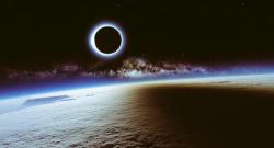 A solar eclipse and the Milky  Way seen from the ISS
