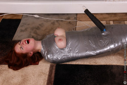gaggedutopia:  Leila vs. Her Wrapped Bliss #mummification #bondage #forcedorgasm Watch over 15 minutes of HD video and 85 images at http://bondagejunkies.com and http://c4s.com/studio/47664