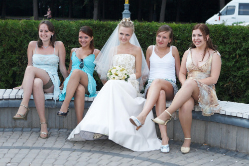 Bride bridesmaid flashing