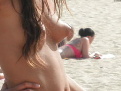 nice torpedo tits voyeured on the beach!