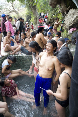 Hot Springs Bathing Festival, by Colette Fu.Every Spring Festival, the Lisu people gather at the Hot Springs by the Nujiang River. By taking baths and washing off dirt with sacred spring water, people hope for forthcoming auspiciousness.