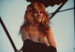 crystallineknowledge:“Another cute shot of Stevie Nicks biting her lip and smiling during her first solo tour in Phoenix, AZ.” - © Dorian Boese