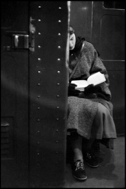 wehadfacesthen:  A reader on the New York subway, photo by Inge Morath, 1957