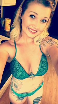 CleverKisses looking so cheerful and sexy in the kitchen
