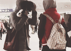 oh-luhans:   luhan covering tao’s face with his fur hood  