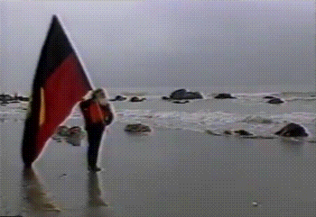 kropotkindersurprise:January 26 1988 - Burnum Burnum plants the Aboriginal flag at the cliffs of Dover, claiming England for the Aboriginal peoples of Australia, exactly 200 years after Arthur Phillip claimed Australia for the British. [video]The full