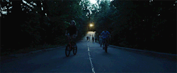 gonegirlbyeee-blog:  One of the first shots that we did when we were shooting pre-scheduled material; we shot the children riding their bikes. It was such a great shot, we were gonna use it in the trailer. We really didn’t have a place for it in the