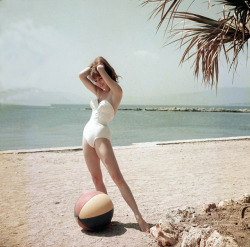 thepieshops:  Brigitte Bardot in Cannes Brigitte Bardot photographed in France at the Cannes Film Festival in 1953. 