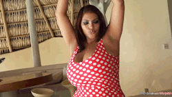   Dominican Poison showing off her red polka dot dress - GIF Set
