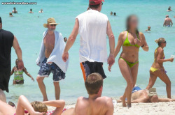 proudofherbush:  Ladies, take note…Full Bush   tiny, sheer bikini = lots of attention at the beach!