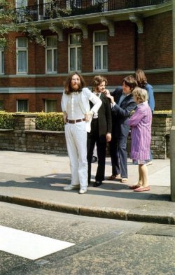 The Beatles prepare to cross Abbey Road 44 years ago today for what would become one of the most iconic photographs in music history