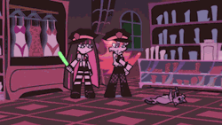 Just Panty and Stocking, dressed as cops, slappin a zombie cat with dildos, though to be fair they kind of look like lightsabers.