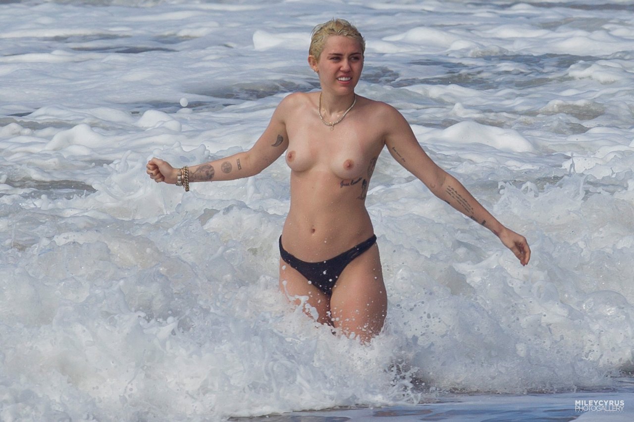 Miley cyrus topless beach