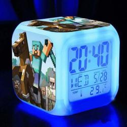 breakawaygeek:  Geek out with this   Minecraft alarm clock with LED multifunction night light!* Glowing LED with 7 Color Change* Plays 8 Alarm Songs* Displays - Hour -Minute-Date-Month-Week- Temperature* Alarm and Sleep Function* Excellent Night Light