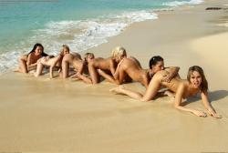 swingersvacations:  Nude beach daisy chain!!   Looks like fun