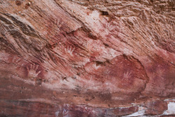 ancientart:Prehistoric Aboriginal rock art at the Mutawintji National Park, NSW, Australia. For 1000s of years Mutawintji was a highly important spiritual meeting place in Australia, and its rock art dates from over 8,000 years ago. The handprint stencils